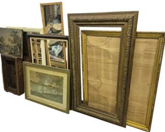 4136 - Group of Vintage Mirrors, Frames & More (Description): A collection of vintage mirrors, frames, and  related items. The lot includes ornate gilt  picture frames with decorative carved  details, a beveled mirror with dark frame, a  small wooden wall cabinet with painted landscape panel, a framed landscape painting  or print depicting trees, and various other  wooden frames in assorted sizes and styles.  Ideal for decorators, artists, or restoration  projects.