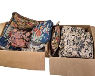 4017 - Group Lot of Decorative Throw Pillows (Description): A group lot of decorative throw pillows in  assorted sizes, patterns, and colors. The  collection includes various floral designs,  tropical motifs, and striped patterns in a  range of colors including blue, pink, coral, cream, and earth tones. The pillows feature  different fabric textures and styles suitable  for home decor.