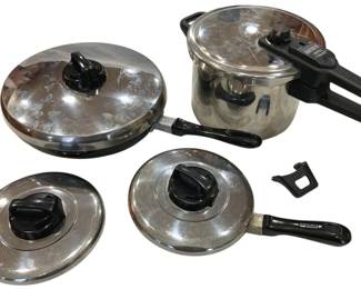 925 - T-Fal Stainless Steel Cookware (Description): T-Fal stainless steel cookware including a  pressure cooker with locking lid and black  handles, along with two lidded skillets with  matching black handles. The set features  polished stainless steel construction with pressure regulation knobs on the lids.