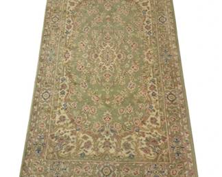 4022 - Green Floral Persian Style Area Rug 68"x35" (Description): A Persian-style area rug featuring a sage  green central field with an elegant floral  medallion design. The rug displays intricate  pink, rose, blue, and cream floral motifs  throughout, surrounded by a complementary ivory border with coordinating botanical  patterns. Finished with decorative knotted  fringe along both ends.