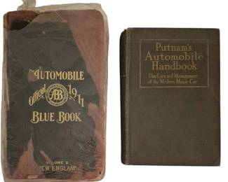 3798 - 1911 Automobile Blue Book & 1919 Handbook (Description): Two early automotive reference books. The  first is a 1911 Official Automobile Blue  Book, Volume 2 covering New England, with a  leather cover showing significant wear and  age. The second is Putnam's Automobile Handbook from 1919, subtitled 'The Care and  Management of the Modern Motor Car,' bound in  olive green cloth. Both books represent  important early 20th century motoring  resources for automobile owners and travelers