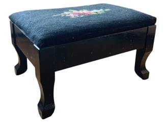 1410 - Needlepoint Stool 14"x9.5"x8" (Description): Needlepoint stool featuring a dark  upholstered top with floral needlepoint  design, set on a wooden base with curved  cabriole legs.