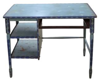 4122 - Vtg Blue Painted Wood Desk w/ Shelves (Description): Vintage painted wooden desk featuring a  distressed blue finish with darker blue  decorative trim along the edges. The desk  includes two side shelves on the left and  turned legs with stretchers. Shows charming wear consistent with age and use. Measures 30  inches high by 40 inches wide by 21 inches  deep.