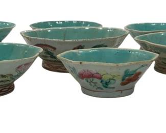 1206 - Vtg Turquoise Glazed Ceramic Bowls Set of 9 (Description): A collection of nine vintage antique  turquoise glazed ceramic bowls in various  sizes and shapes. The bowls feature a  distinctive aqua-green glaze with organic,  scalloped edges and show charming signs of age including crazing and wear consistent  with their age. The set includes both larger  serving-style bowls and smaller accent  pieces, all unified by their striking  turquoise coloration.