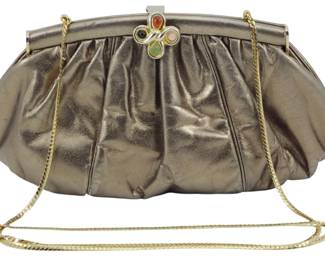 1858 - Vintage Judith Leiber Evening Purse 5"x9"x3" (Description): Vintage Judith Leiber evening purse featuring  a metallic gold leather body with pleated  design. The purse has a decorative jeweled  clasp closure and a delicate gold chain  strap. Measures 5 inches high by 9 inches wide by 3 inches deep.