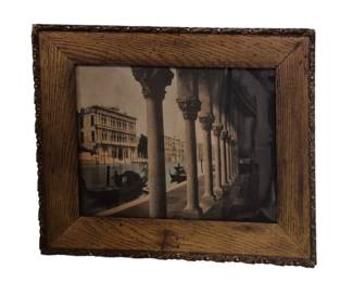3778 - Antique Oak Frame w/ Venice Canal Scene 20x24 (Description): Antique oak frame featuring decorative carved  molding along the outer edges. The frame  houses a vintage photograph or print  depicting a Venice canal scene with gondolas  and classical columned architecture. The oak shows attractive grain pattern and warm  patina consistent with age.