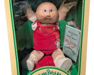 4155 - Cabbage Patch Kids Quinn Mario Doll in Box (Description): Cabbage Patch Kids doll named Quinn Mario.  The doll comes in original packaging with  birth certificate and adoption papers  included.