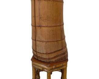 1378 - Japanese Ikebana Bamboo Vase on Stand (Description): Featuring a tall cylindrical upper section  resting on a hexagonal bamboo base with  stretchers. The piece measures 20 inches in  height by 6 inches in diameter.