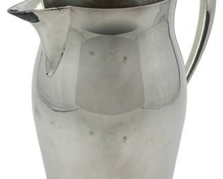 78 - Poole Silver Co. Silver Plate Pitcher (Description): Poole Silver Co. Silver plate  Reproductionware pitcher. Measures 7.5 inches  in height.