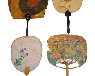 1442 - Four Vintage Japanese Uchiwa Fans (Description): Collection of four vintage Japanese  uchiwa-style celluloid fans. The fans feature  various decorative motifs including a bold  red, orange and black swirl pattern, delicate  cherry blossom branches on cream ground, purple bellflowers with green foliage, and a  traditional ukiyo-e style scene depicting  geishas in colorful kimono. The fans have  assorted handles in wood and lacquered  finishes. Some show age-appropriate wear.