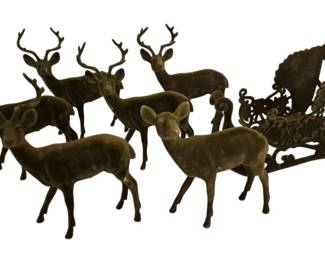 4175 - Vintage Green Felt Reindeer & Sleigh Set (Description): This charming holiday display features a  group of flocked deer figurines in various  poses, including several bucks with antlers  and does, arranged alongside an ornate  decorative sleigh. The pieces have a velvety green felt covering.
