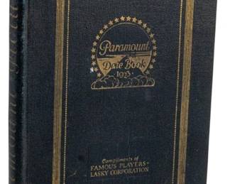 790 - 1923 Ed. Paramount Date Book (Description): 1923 edition Paramount Date Book. This  hardcover date book features gold embossed  lettering and decorative border on the cover,  presented with compliments of Famous  Players-Lasky Corporation.