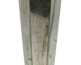 711 - Decorative Silver Plate Vase 12" (Description): Decorative silver plate vase featuring an  elegant tapered form with a scalloped rim and  pierced floral design at the top. The vase  rests on a circular base. Measures 12 inches  in height.