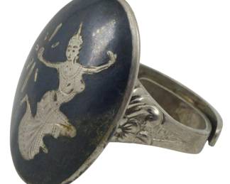 1739 - Siam Sterling Silver Ring 0.17oz Adjustable (Description): Siam sterling silver ring featuring  traditional Thai niello work with a dancer  figure on the oval face. The band displays  decorative floral motifs. Weight: 0.17oz.