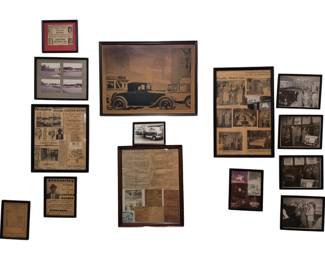 3977 - Collection of Vtg Framed Automotive Photos (Description): A wall collection of vintage framed  photographs and ephemera related to  automotive history. The grouping includes  multiple framed pieces featuring what appears  to be Lakeview Motors and Blanks Motor Co. memorabilia, including newspaper clippings,  advertisements, and promotional materials. A  central large framed image depicts a vintage  automobile from approximately the 1920s-1930s  era. Additional frames contain period