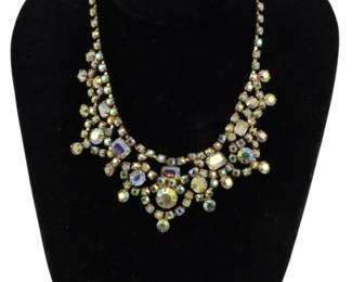 1934 - Vintage Aurora Borealis Necklace (Description): Featuring an ornate design with multiple  sparkling aurora borealis rhinestones  arranged in a decorative collar-style  pattern.
