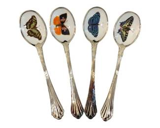 346 - Neiman-Marcus Butterfly Spoons w/ Case (Description): Set of Neiman-Marcus butterfly spoons with  case. Each spoon features a decorative  butterfly design. Measures 6.5" x 6.5".
