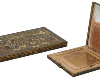 740 - 2 Decorative Enamel Volupte Compacts (Description): Two decorative enamel Volupte compacts. The  compacts feature ornate enamel decoration and  are characteristic of the Volupte brand's  elegant design aesthetic.