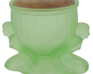 1874 - Frosted Green Glass Tobacco Jar w/ Wood Lid (Description): A frosted green glass tobacco jar with a  wooden lid. The jar features a decorative  form and is fitted with a coordinating wooden  cover.