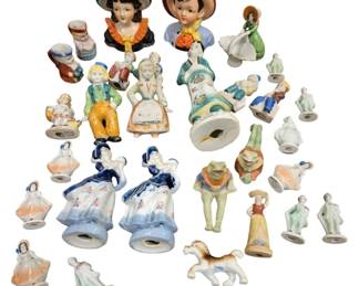 4193 - Group Lot of Occupied Japan Figurines (Description): A group lot of Occupied Japan glassware and  figurines. This collection includes various  hand-painted ceramic pieces featuring figures  in period dress, character busts, bells, and  decorative items, all produced during the post-World War II occupation period of Japan.