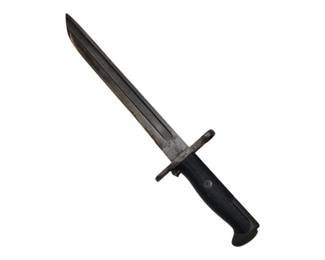 683 - WW II Era Bayonet Signed US, RIA 1919 (Description): With a black ribbed grip handle and steel  crossguard numbered 415832. The blade shows  patina and age-appropriate wear. Measures 15"  long.