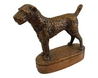 421 - Dog Statue Copper Finish 6.5" (Description): A decorative dog statue featuring a copper  finish. The figure depicts a terrier-type dog  standing in a show pose on an oval base.  Measures 6.5 inches.