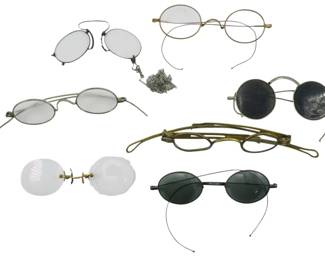 122 - Lot of Assorted Vintage Spectacles (Description): A lot of assorted vintage spectacles  featuring various styles and designs. The  collection includes multiple pairs of  eyeglasses with different frame materials and  lens types, including clear prescription lenses and tinted sun lenses. Some pairs  featu