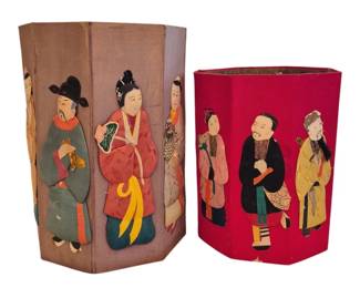 1426 - 2 Octagonal Bins w/ Chinese Paper Figures (Description): Decorated with carved paper Chinese immortals  and figures. One features a mauve/gray  ground with colorful figures in traditional  robes including a scholar and court ladies.  The second has a vibrant red ground with similar carved paper figures in yellow, pink,  and black traditional dress. The raised  paper figures create a dimensional,  decorative effect on both pieces. Largest 12  x 8