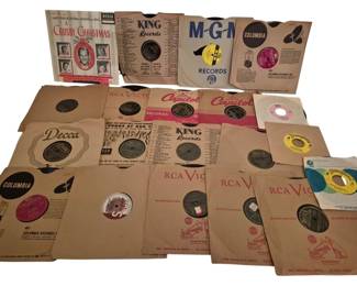 4042 - Group Lot of Vintage 78 & 45 RPM Records (Description): A group lot of vintage records featuring  various labels including RCA Victor, Decca,  Columbia, Capitol, King Records, M-G-M, and  Disneyland. The collection includes both 78  RPM and 45 RPM records in their original paper sleeves. Notable among the collection  is a Bing Crosby Christmas album on Decca.  The records represent a variety of mid-20th  century musical genres and artists from major  record labels of the era.