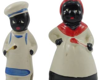 1709 - Pr Vtg Black Americana Shakers 5.5" (Description): Pair of vintage Black Americana salt and  pepper shakers. These ceramic figural shakers  depict a chef and a mammy figure, both with  hand-painted details. Measures 5.5 inches  tall.