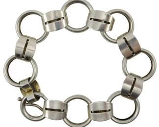 1959 - Napier Sterling Bracelet 0.92oz (Description): Napier sterling silver bracelet featuring a  modern circular link design. The bracelet  weighs 0.92 ounces.