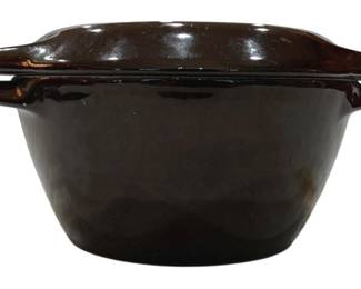 912 - Cast Iron Dutch Oven 9"x4.5" (Description): Cast iron Dutch oven with a rich brown enamel  coating. Features two angular side handles  for easy lifting and a fitted domed lid.  Measures 9 inches in diameter by 4.5 inches  in height.