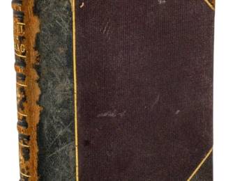 824 - Vtg Edition Shag and Doll (Description): A vintage edition of Shag and Doll. The book  features a cloth and leather binding with  gilt decorative accents. The date of  publication is unknown.