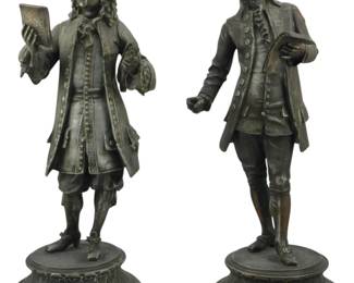 1868 - Pr Leon Pilet Restrikes of Handel & Mozart (Description): A pair of Leon Pilet restrikes depicting  composers Handel and Mozart. These cast  iron/spelter figures stand on stepped  circular bases, each measuring 14 inches in  height.
