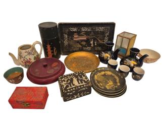 2747 - Group Vtg Asian & Oriental Decorative Items (Description): A group of vintage Asian and Oriental  decorative items including lacquered trays,  plates, boxes, a teapot, cups, bowls, and  various containers. The collection features  traditional Asian motifs with gold and black lacquerwork, hand-painted designs, and  decorative scenes. Pieces include a  chinoiserie style rectangular tray, round  plates with figural scenes, lidded boxes, a  ceramic teapot with floral decoration, small