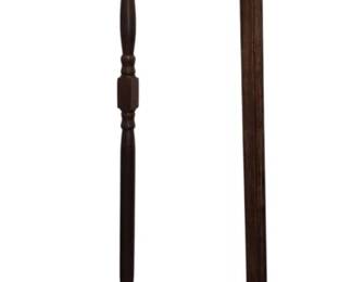 3707 - Two Wooden Standing Coat Racks 69" (Description): Two wooden standing coat racks sold as-is.  One features a turned spindle design with a  finial top and metal hooks, while the other  has a straight post design with double metal  hooks at the top. Both rest on cross-form bases with a dark wood finish. Some hooks  broken
