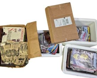 4090 - Several Boxes of Vintage Magazines (Description): Several boxes of vintage magazines. The  collection includes various publications such  as Connoisseur and Smuggler magazines, along  with assorted vintage newspaper clippings  and periodicals. The magazines span different eras and cover a variety of subjects  including collectibles, railroads, and  general interest topics.