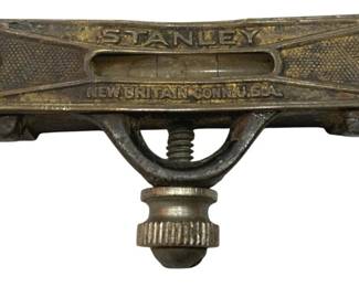 1211 - Vintage Stanley Line Level Tool (Description): Vintage Stanley line level tool, manufactured  in New Britain, Connecticut, USA. This cast  iron level features the classic Stanley  branding embossed on the top surface with a  knurled brass thumbscrew attachment mechanism. The tool shows an attractive aged  patina consistent with its vintage origins.  Measures 3 x 1.5 Used as is electric/electronic/mechanical  item. No guarantee all components, untested.