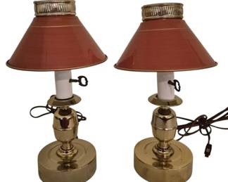 3814 - Pr of Brass Lamps with Metal Shades 13" (Description): Pair of brass lamps with metal shades,  measuring 13 inches tall. The lamps feature  polished brass bases with an urn-shaped body  and faux candle sleeves. The conical metal  shades are finished in a terracotta red color with gold accent bands and decorative  pierced metal galleries at the top. Both  lamps are wired and ready for use. Used as is electric/electronic/mechanical  item. No guarantee all components, untested.