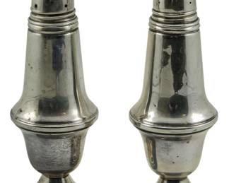 101 - Pr Crown Sterling Shakers 5.5" (Description): A pair of Crown sterling silver salt and  pepper shakers. Each shaker measures 5.5  inches in height. Weighs 8.00oz.