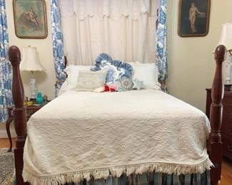 1331 - Full Size Acorn Post Walnut Bed w/ Bedding (Description): The bed features classic turned posts in rich  walnut wood believed to to be made by  Howerton. Lot includes vintage bedspread,  bedskirt, canopy (hardware to hang canopy is  not included as it is mounted to wall), bedding, mattress & pillows. Measures 51 x 57  x 78 overall