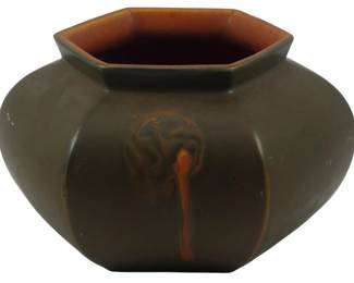 858 - Roseville Rosecraft Hexagonal Pottery Vase (Description): Roseville Rosecraft hexagonal pottery vase  featuring the distinctive Arts and Crafts  styling characteristic of this line. Measures  4.5 inches by 6.5 inches.