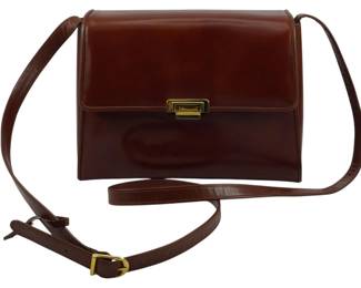 1780 - Vintage Anne Klein Leather Crossbody Purse (Description): Vintage Anne Klein leather crossbody purse  featuring a fold-over flap with gold-tone  turn-lock closure and an adjustable shoulder  strap with buckle. Measures 8" x 9" x 3".