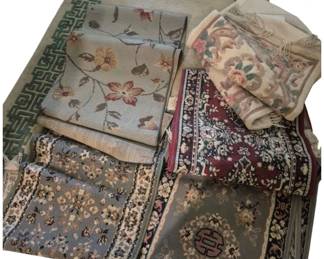 3942 - Lot of Runners & Rugs (Description): A lot of runners and rugs in various patterns  and colors. This collection includes  multiple floor coverings suitable for  different spaces throughout the home.