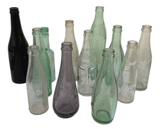 1648 - 12 Assorted Pop Bottles - 10" Tall