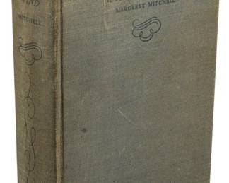 765 - 1938 Early Ed. Gone with the Wind (Description): A 1938 early edition of Gone with the Wind by  Margaret Mitchell, published by Macmillan.  This classic novel of the American South  during the Civil War era remains one of the  most beloved works of American literature.