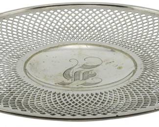 102 - Reticulated Silver Plate Platter 1.5"x10" (Description): Unknown maker silver plate platter featuring  a reticulated pierced border design  surrounding a central medallion with engraved  monogram. Measures 1 1/2" x 10".