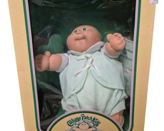 4156 - Cabbage Patch Kids Preemie Scotty Jack (Description): Cabbage Patch Kids Preemie doll named Scotty  Jack. The doll comes in its original box with  adoption papers and certificate.