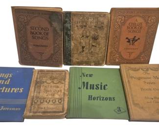 4204 - Vintage Song Books (Description): A collection of vintage song books. These  books feature various musical content and  represent different publishers and eras of  children's and educational music literature.