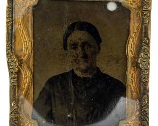 196 - Ninth Plate Tintype of Woman (Description): Ninth plate tintype photograph of a woman,  presented outside of its original frame. The  image measures 2 1/2" x 2".